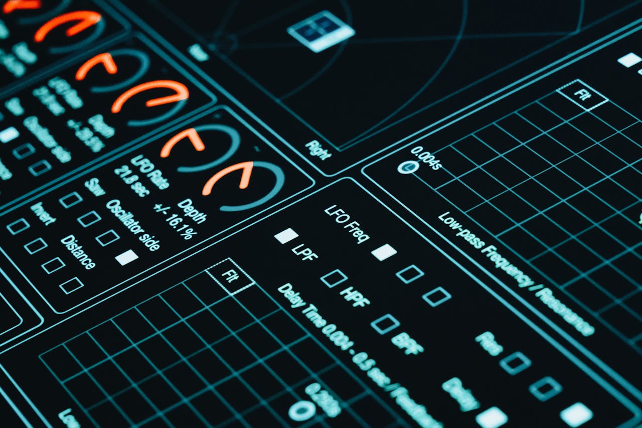 About Close-up of a digital interface showcasing futuristic graphs and data analytics in low light.